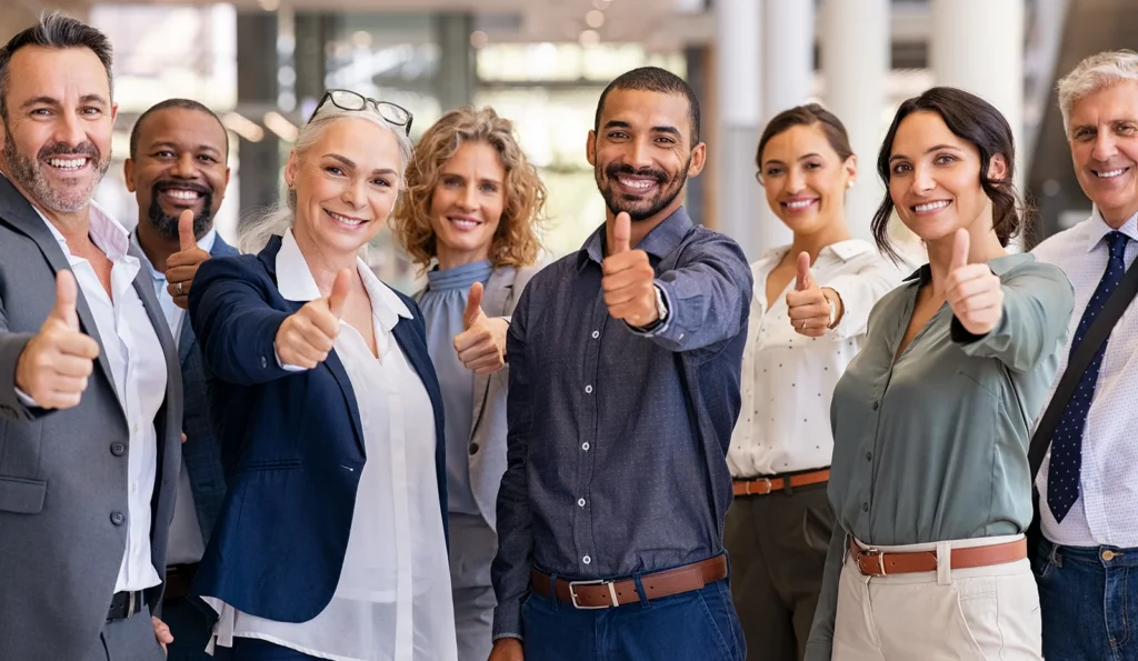 An abstract image of team DNM thumbing up happily